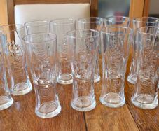 Carlsberg branded 1/2 pint pilsner glass with embossed Logo