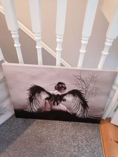 Beautiful angel canvases. Diammante edge around canvas  lovely on a wall