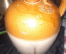 A Antique Stoneware Flagon or 1 Gallon Jug, likely dating from the 19th or early 20th century