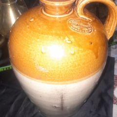 A Antique Stoneware Flagon or 1 Gallon Jug, likely dating from the 19th or early 20th century