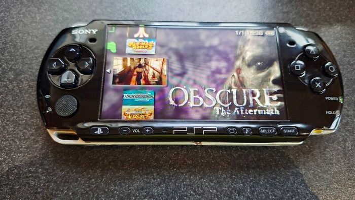 Modded Black PSP Slim 3000 128GB with games