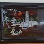 Vintage Vietnamese black lacquer wall plaque featuring intricate mother-of-pearl inlay. Image 3