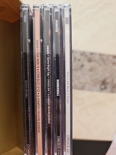 2 Oasis CD Singles Boxsets