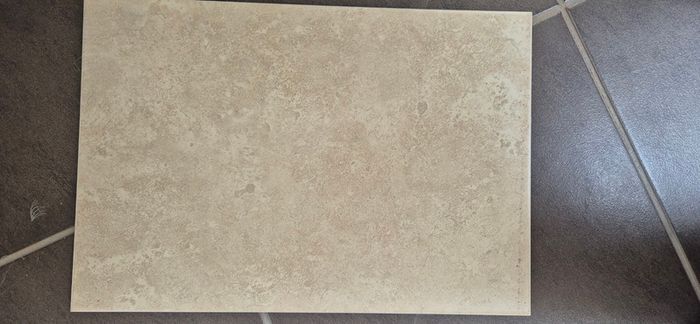 Beige stone-effect ceramic wall tiles