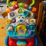 VTech First Steps Baby Walker, a popular 2-in-1 interactive push toy and activity center designed to help toddlers learn to walk.  Working perfectly. Image 3