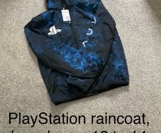 Raincoat brand new, 12 to 14 years