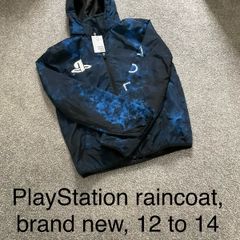 Raincoat brand new, 12 to 14 years
