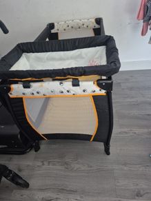 travel cot with baby changer