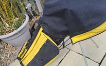 Golg bag with clubs.