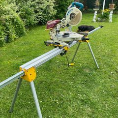 Makita mitre 260mm saw 110v and DeWalt leg stand