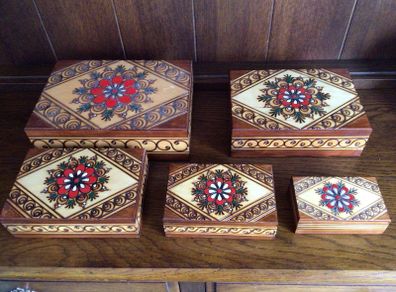 5 piece wooden carved graduating boxes