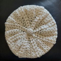 Hand knitted aran beret