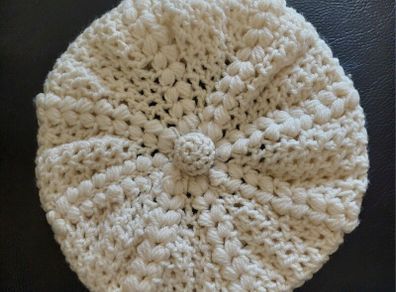 Hand knitted aran beret