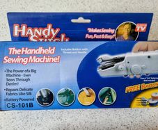 Sewing machine - Hand held portable & cordless