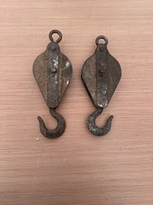 Pair of vintage pulleys