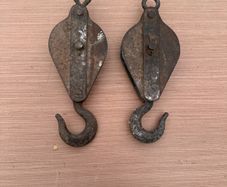 Pair of vintage pulleys