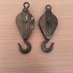Pair of vintage pulleys