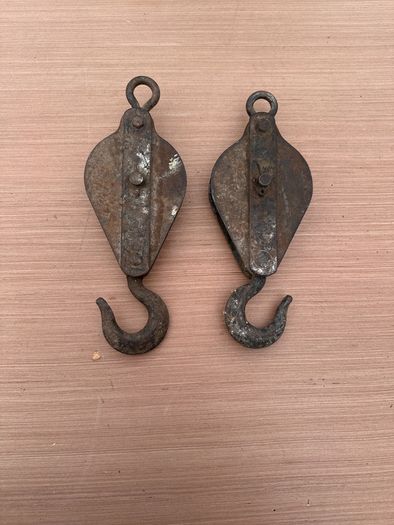Pair of vintage pulleys