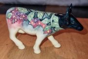 Porcelain colorful cow figurine