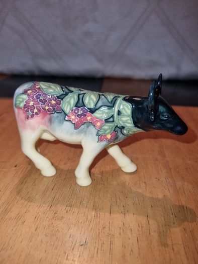 Porcelain colorful cow figurine