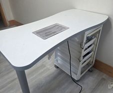 Nail manicure table with installed dust extractor