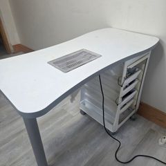 Nail manicure table with installed dust extractor