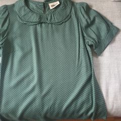 Green short sleeved top with small white dots, never worn
