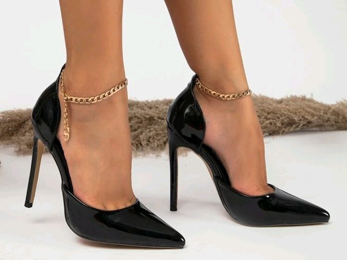 Black shiny leather stilettos with gold ankle chains, size 39