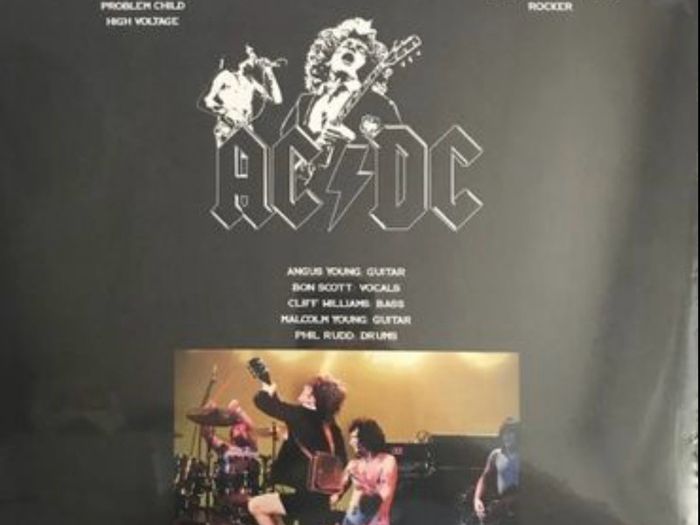 AC/DC limited edition orange coloured vinyl record. Mint condition. Recorded live at the Agora Ballroom Cleveland August 22nd 1977