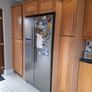 Solid oak kitchen shaker style American style samsung fridge freezer and electric hob. Image 4