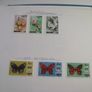 A collection of stamps from various countries on pages in binder (1880s-1990s) Image 2