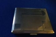 Old Machine Turned Cigarette Case