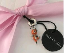 Pandora Disney Parks Epcot Red Bird - Parks Exclusive Charm