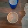 Empty holy water bottles and other religious items Image 6