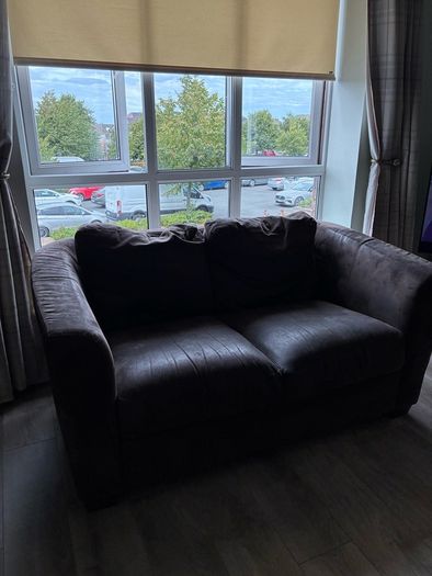 Two 2 seater couches in brown suede