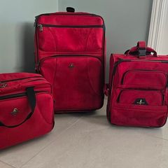 3 matching suitcases plus 1