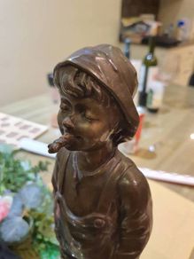 Fisher boy, bronze statue