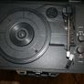 Akai A60011N Bluetooth Vinyl Turntable with Built-In Rechargeable Battery, 2 x 5 W Stereo Speakers, 3.5 mm AUX Jack, RCA Output, 3 Hours Playtime, Briefcase Style with Faux Leather Case, Black Image 6