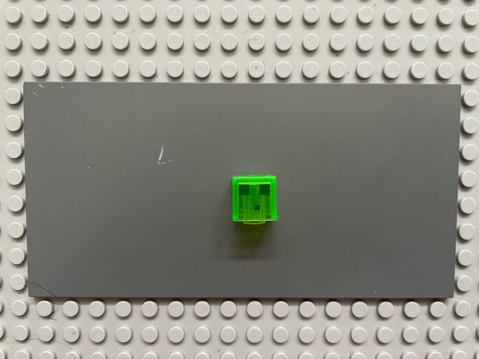 lego Minecraft Minifigure, Head, Modified Cube with Pixelated Dark Green Eyes and Mouth Pattern (Minecraft Slime) minifigure