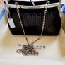 Newbridge black evening bag in box. Image 3