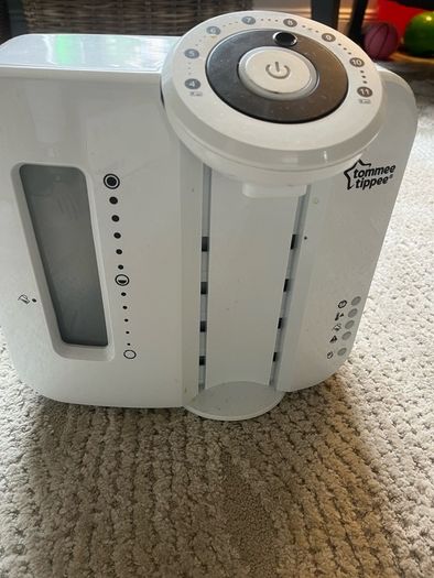 Medela Swing pump and Tommy Tippee bottle maker
