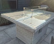 Beautiful, barely used, rattan fire pit table.