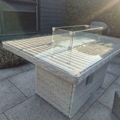 Beautiful, barely used, rattan fire pit table.