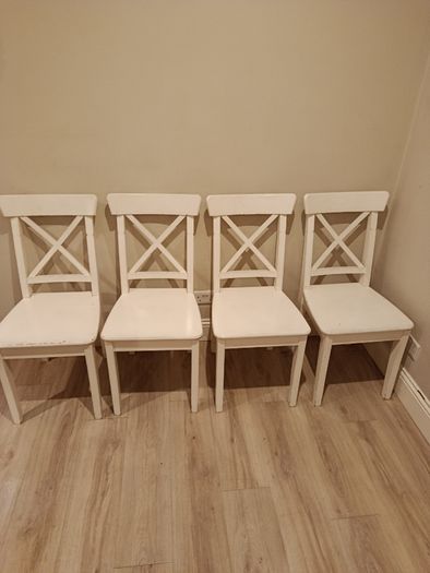For sale: a set of 4 classic IKEA dining chairs, model INGOLF in white.!