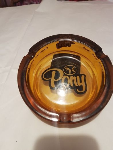 Vintage pony ashtray,,from 1960s vintage, collectors item,,good condition, 2 little chips ,,but hard to see ,,overall good condition,,price includes post to anywhere in ireland  by certificate proof of post  thank you, hard to come by ,
