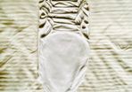 6 white string bodysuits