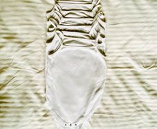 6 white string bodysuits