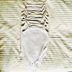 6 white string bodysuits