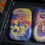 Three Pokemon tins with two coins. Image 2