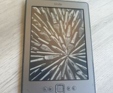 Amazon Kindle 4 D01100 Wi-Fi E-Book Reader